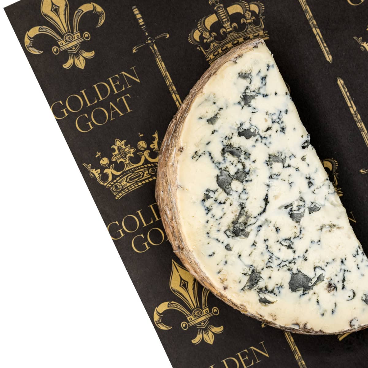 A wedge of blue cheese with a mottled rind, placed on a paper with 'GOLDEN GOAT' and crown motifs.