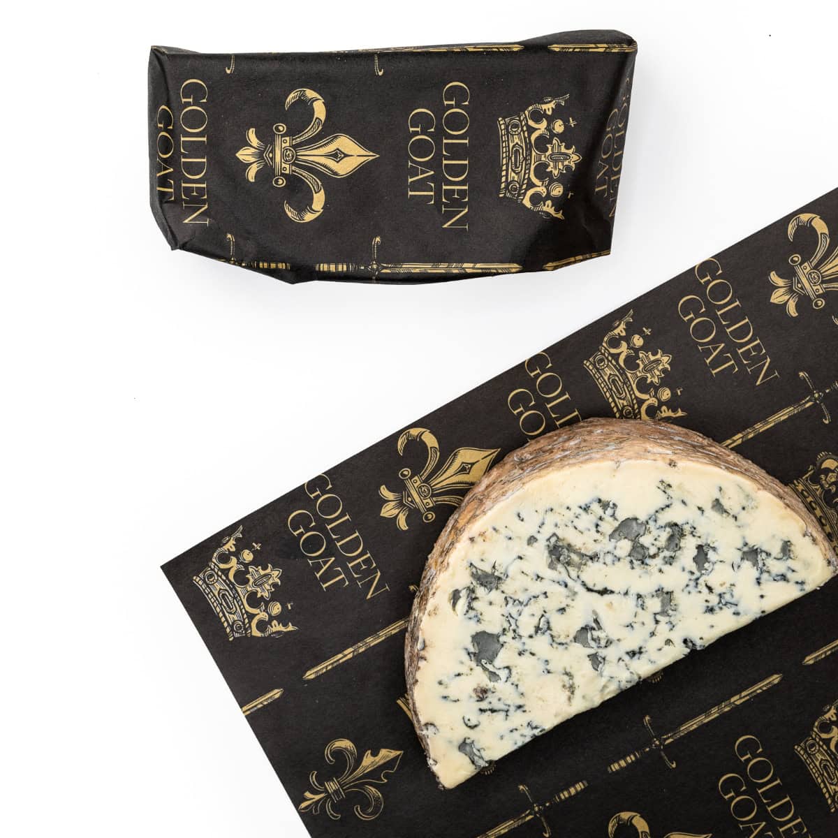 A block of Fourme D'Ambert cheese on a paper with the golden goat logo and a crown and sword motif.