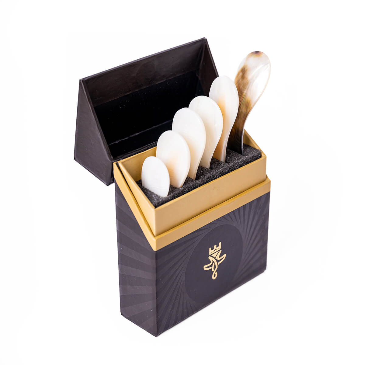 Box of pearl caviar serving spoons.