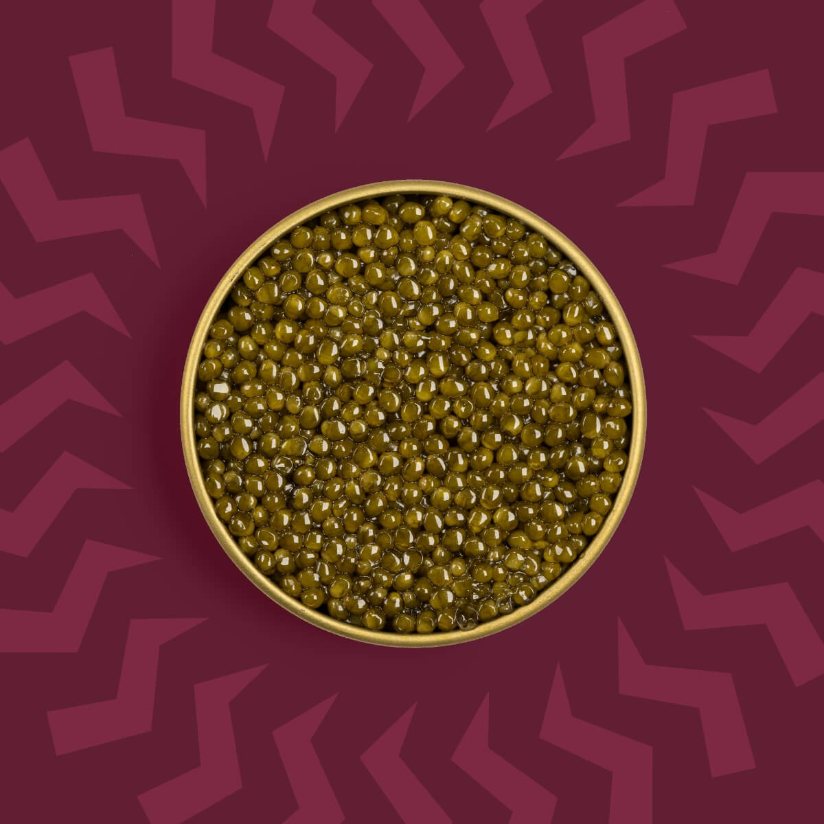 Light brown caviar in a caviar tin on a red background.