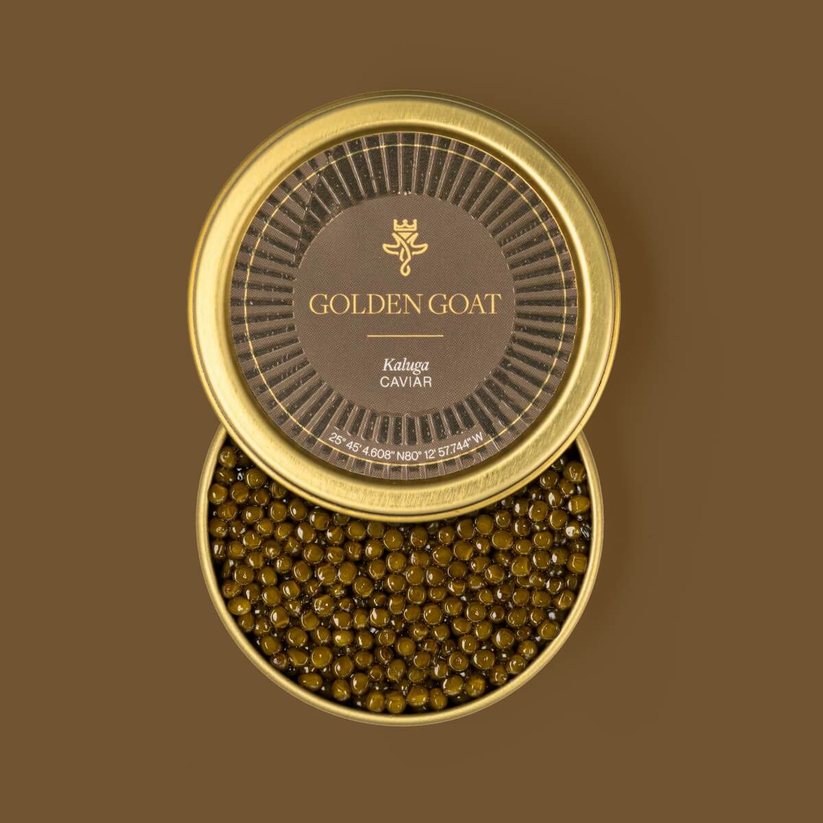 A tin container with Kaluga caviar visible through the top opening, branded with 'GOLDEN GOAT' on a label.