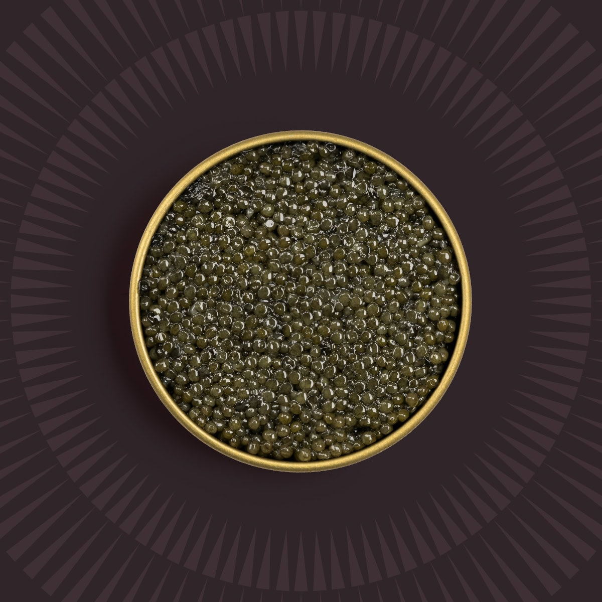 Green caviar pearls in a golden caviar tin on a patterned brown background.