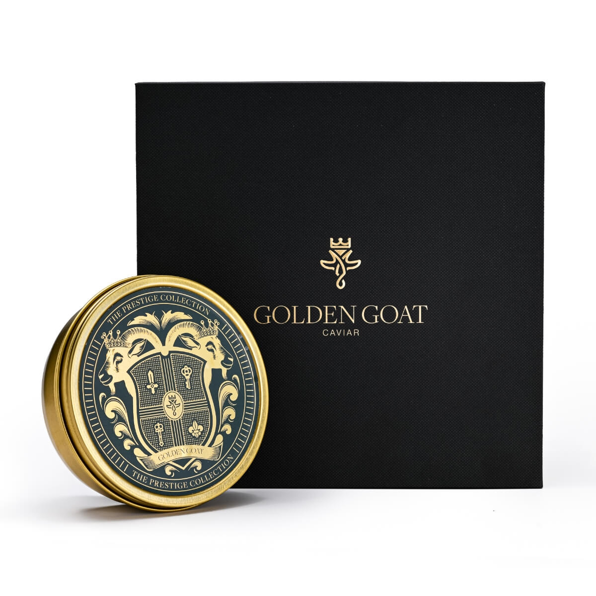 The prestige collection caviar tin in front of a gift box with 'GOLDEN GOAT' embossed on it.
