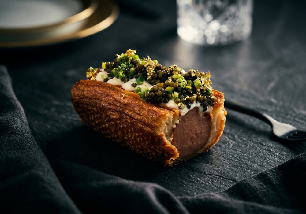 We tried the Golden Glizzy, the Miami Open's $100 caviar-topped hot dog
