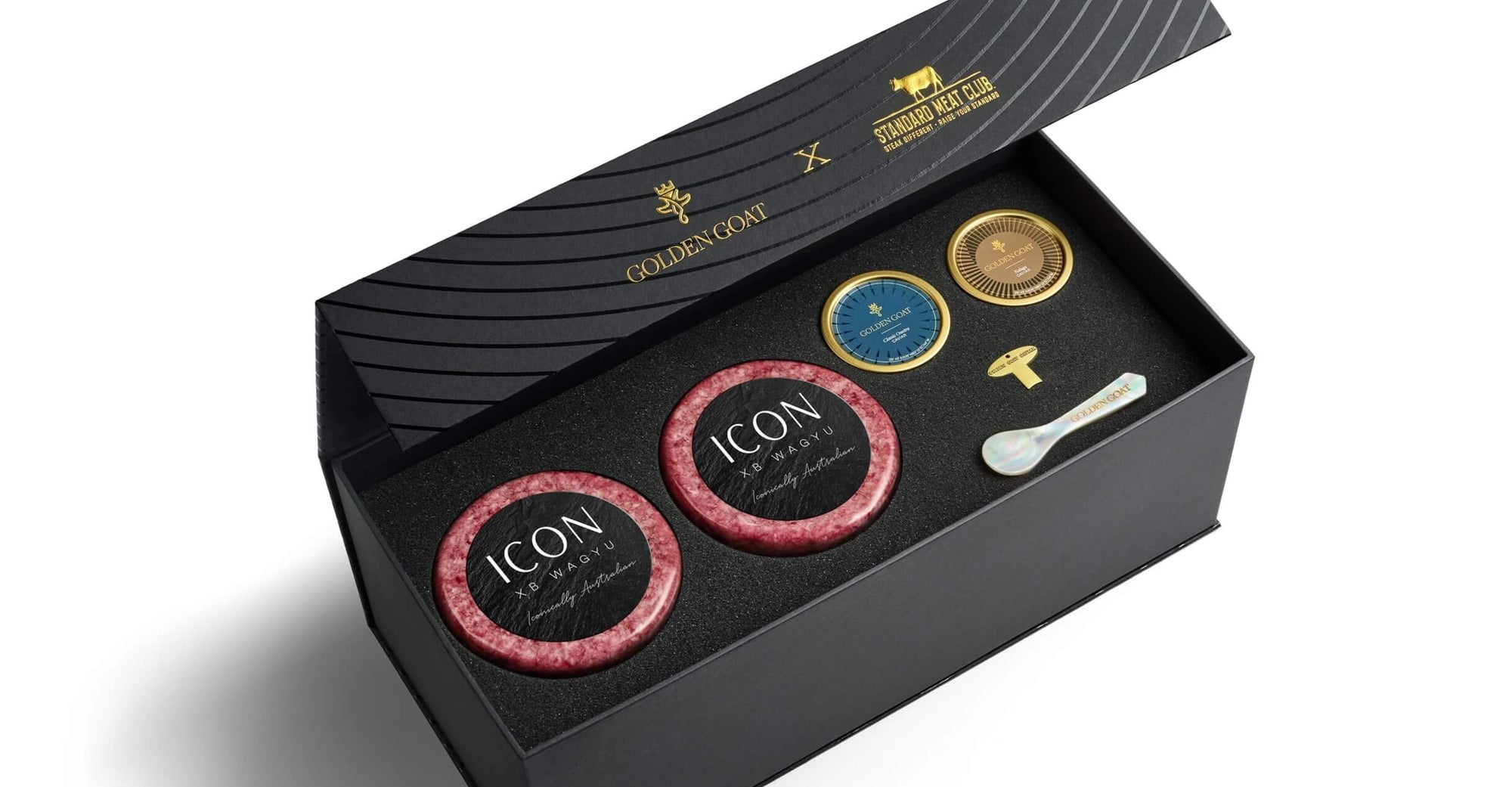 Black gift box with 'ICON' wagyu beef and a selection of caviar on a white background.