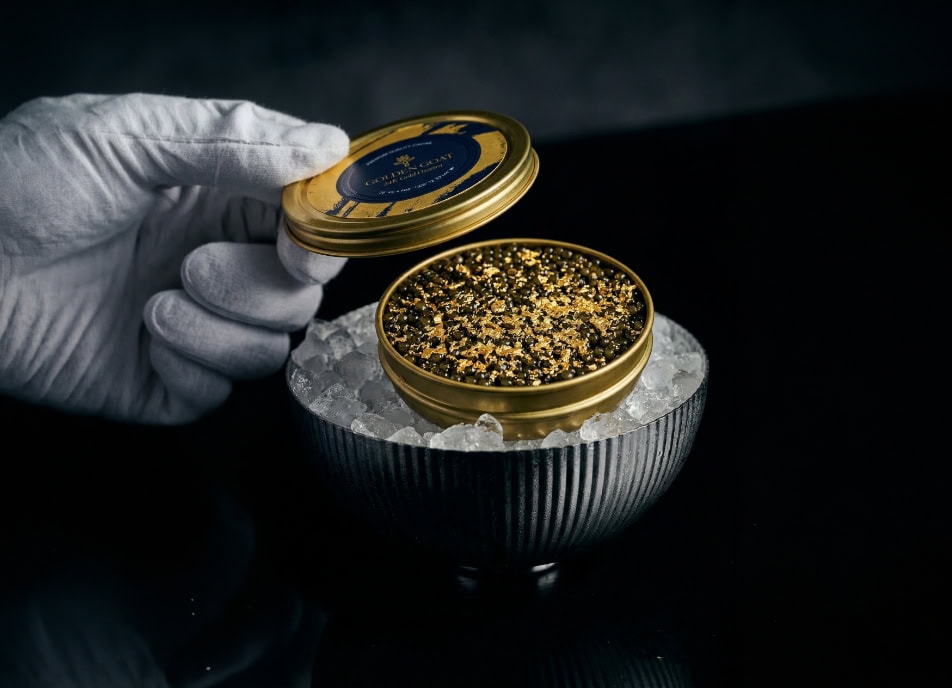 Why is caviar served over ice?