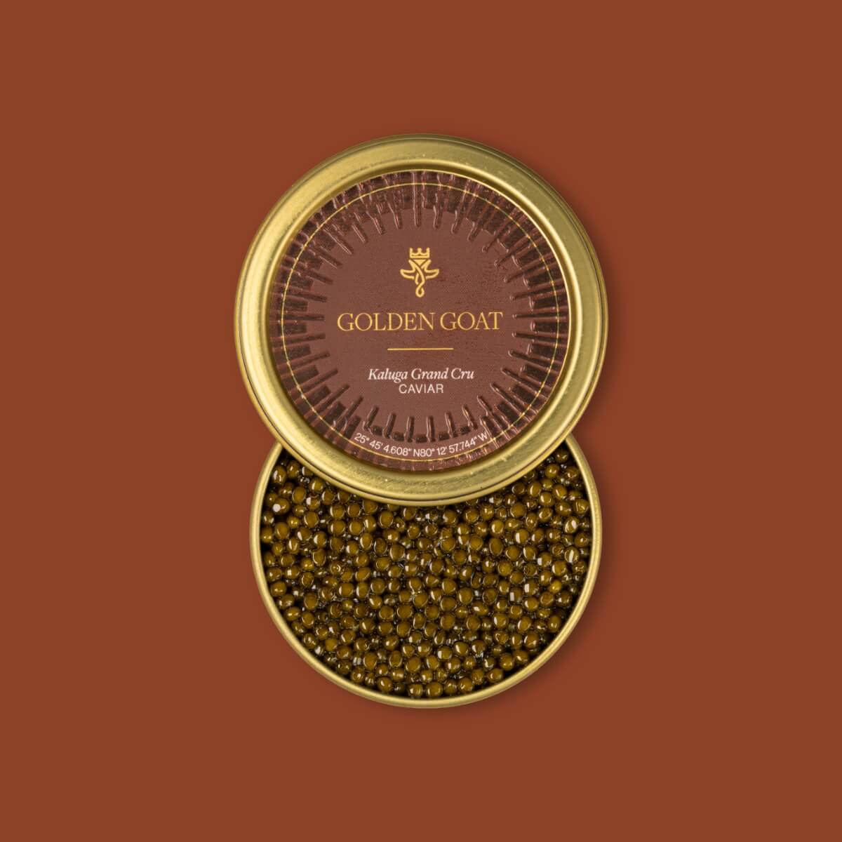 Open container of caviar with 'Golden Goat' branding on a brown background