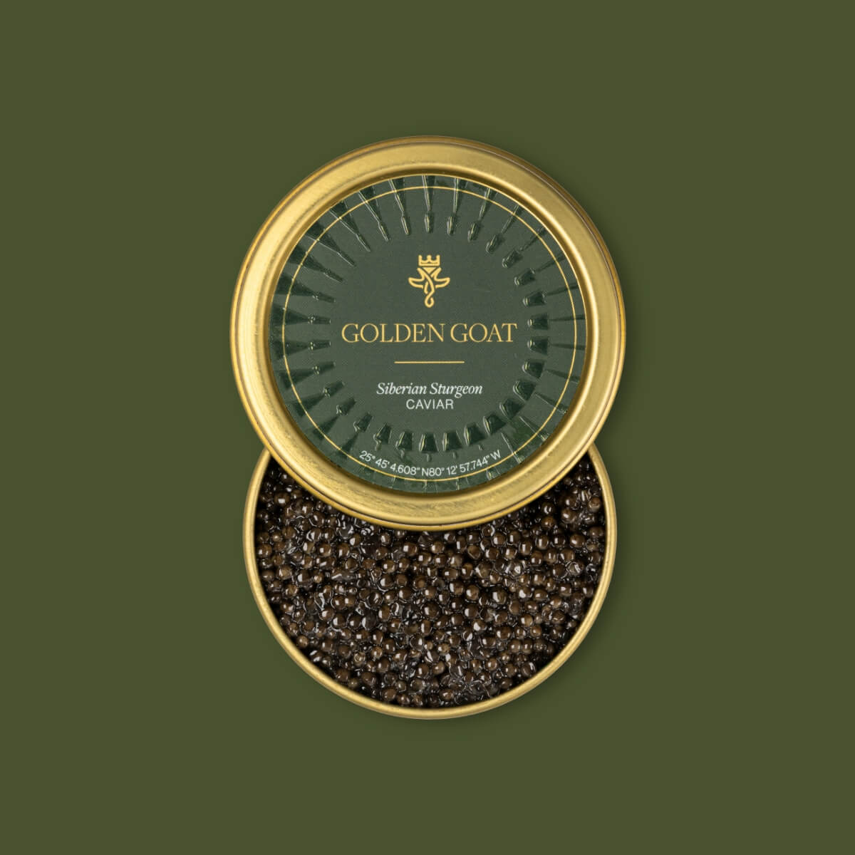 Open container of Golden Goat caviar on a green background